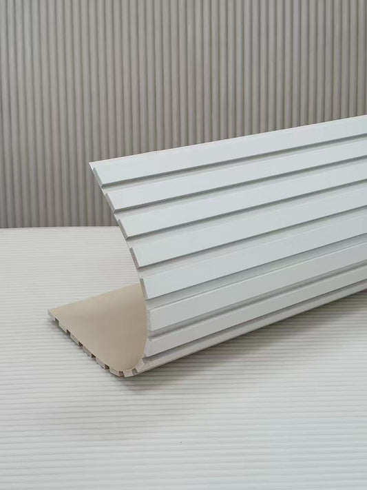 Panneau mural super flexible film PVC Kurv posé sur une surface courbe